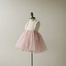 Load image into Gallery viewer, Children's pink tulle skirt with white ruffle straps on a mannequin against a plain background